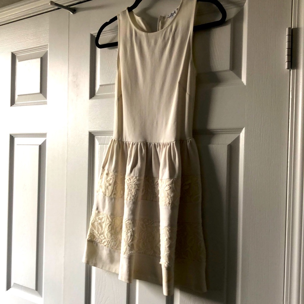 White mini flounce dress